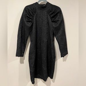 Black exaggerated shoulder cocktail dress